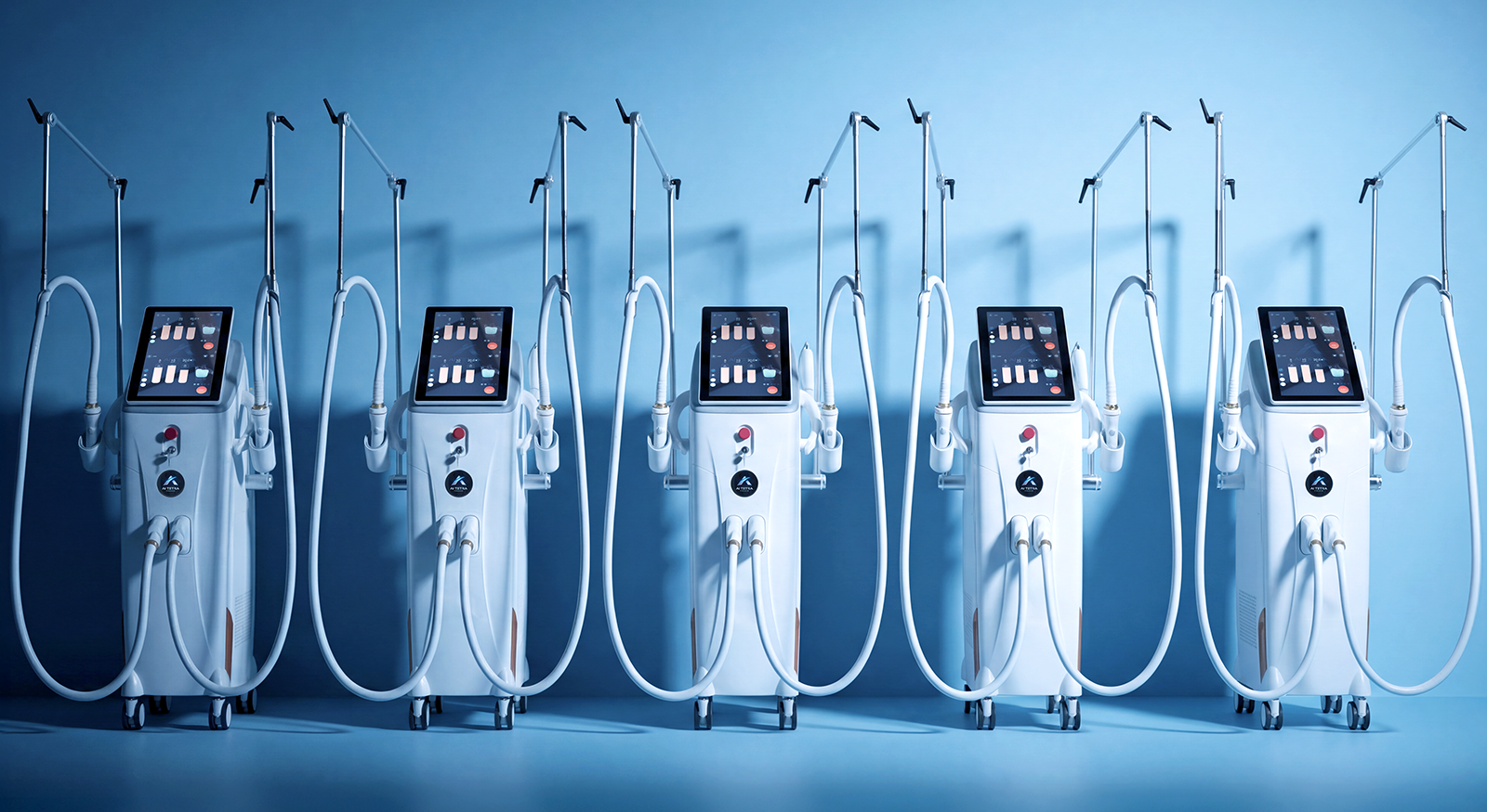 AI Tetra Freeze quad-wavelength diode laser system with dual handpieces — full machine view